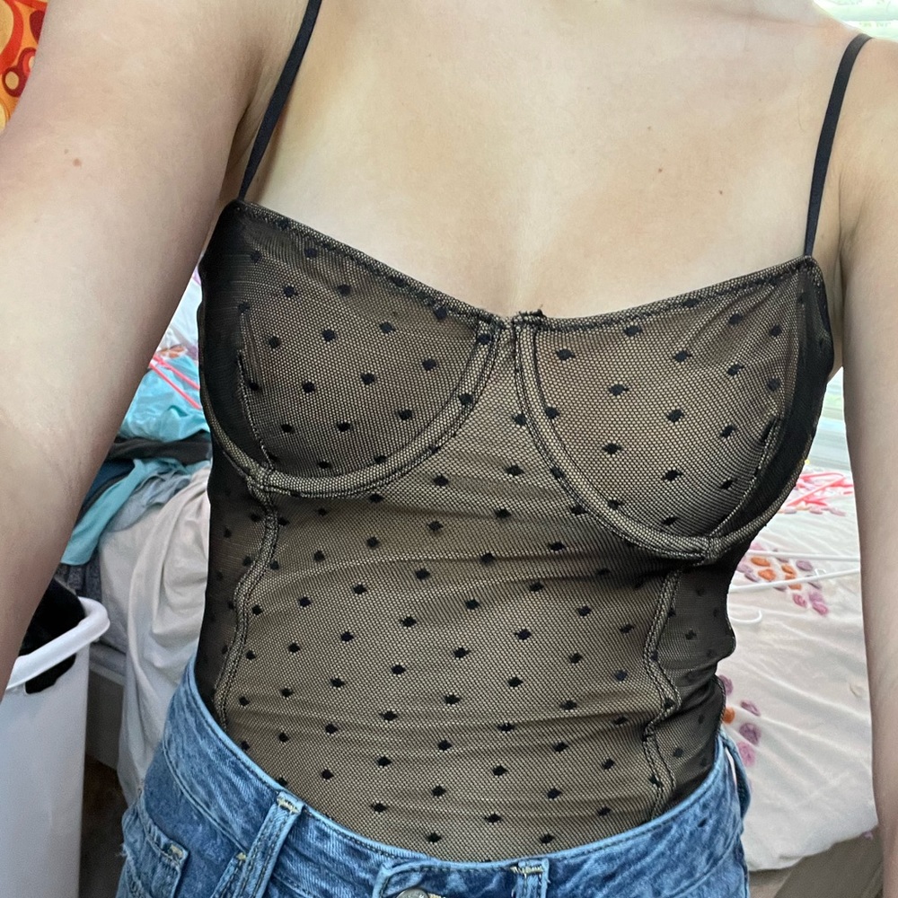 nude and black body suit